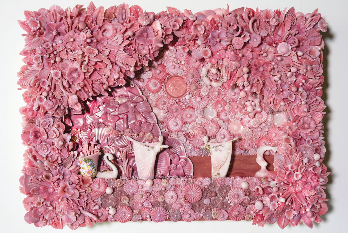 Similar colored shells arranged to create an image