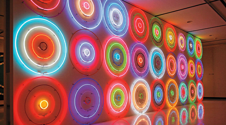 Three rows of colorful neon circles