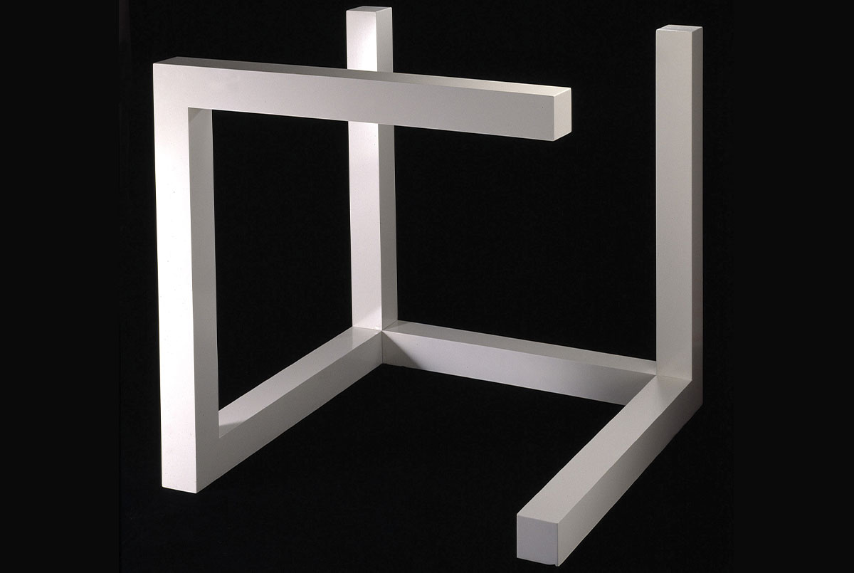 Gray 3-D design with black backdrop