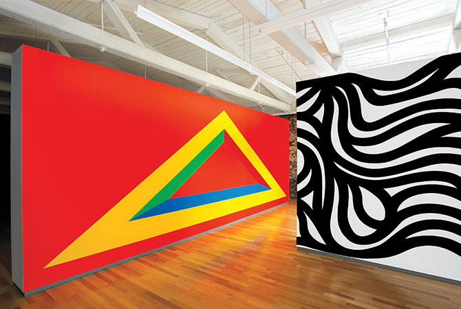 Enlargeable image of red wall with colorful triangle and wall with black and white pattern