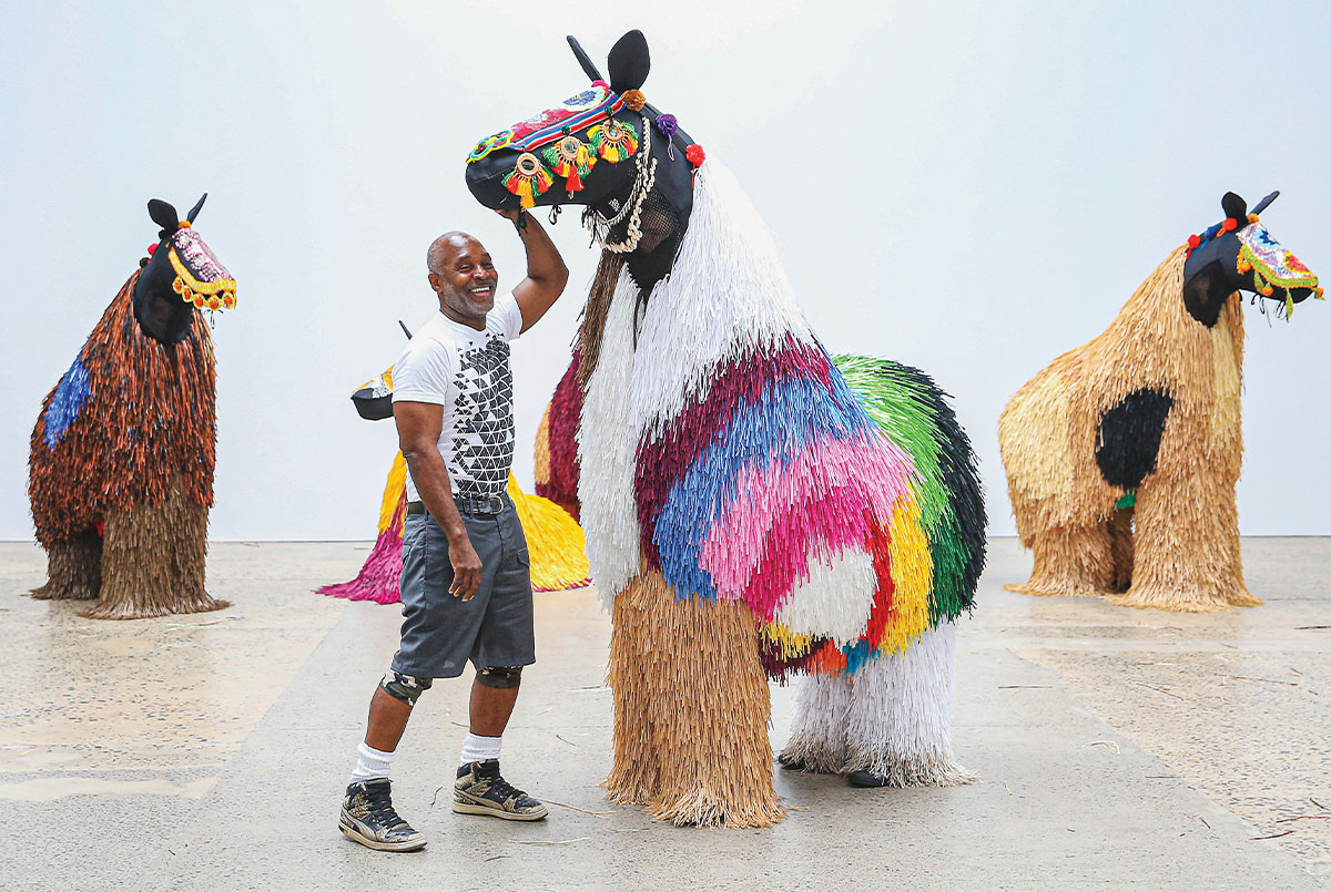 Artist with the creatures he created
