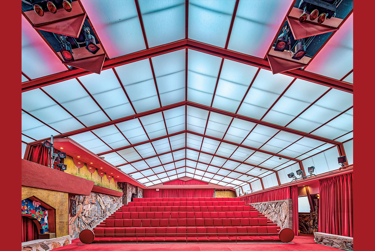 Theatre with a translucent-paneled window ceiling