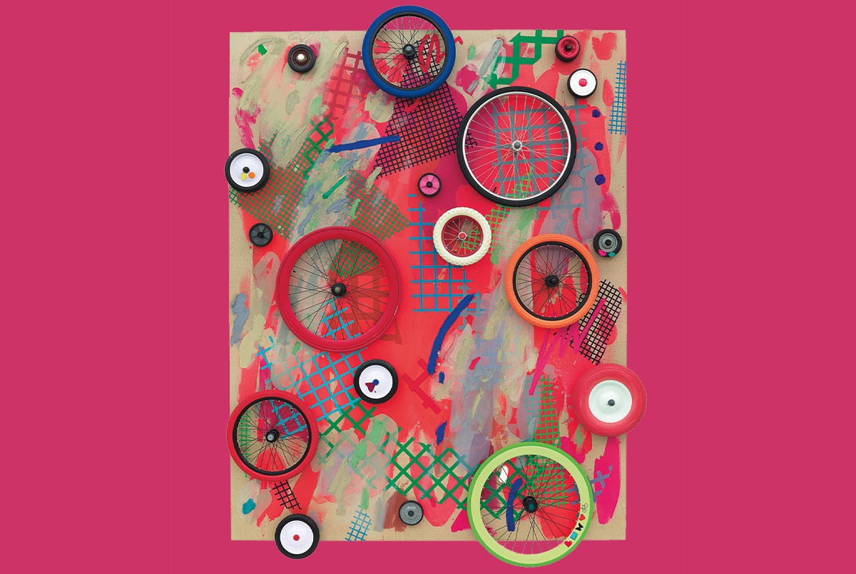 Multimedia painting with red splotches and three-dimensional wheels