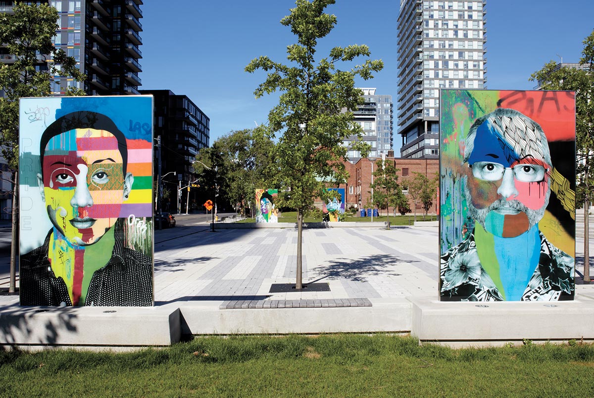 Image of two colorful murals in a city park